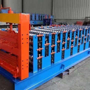 Trapezoidal and corrugated double layer roofing sheet machine