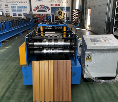 Wall cladding panel roll forming machine
